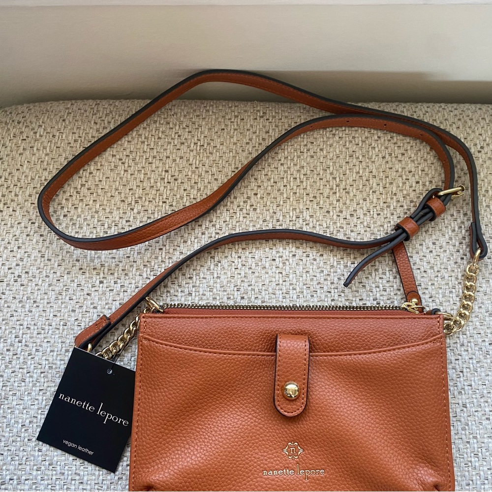 Nanette Lepore small crossbody purse. Vegan leather, “ginger” never used.
